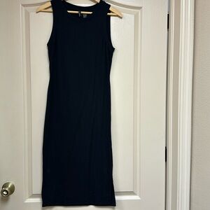 Ribbed knit material dress with one side pleat.